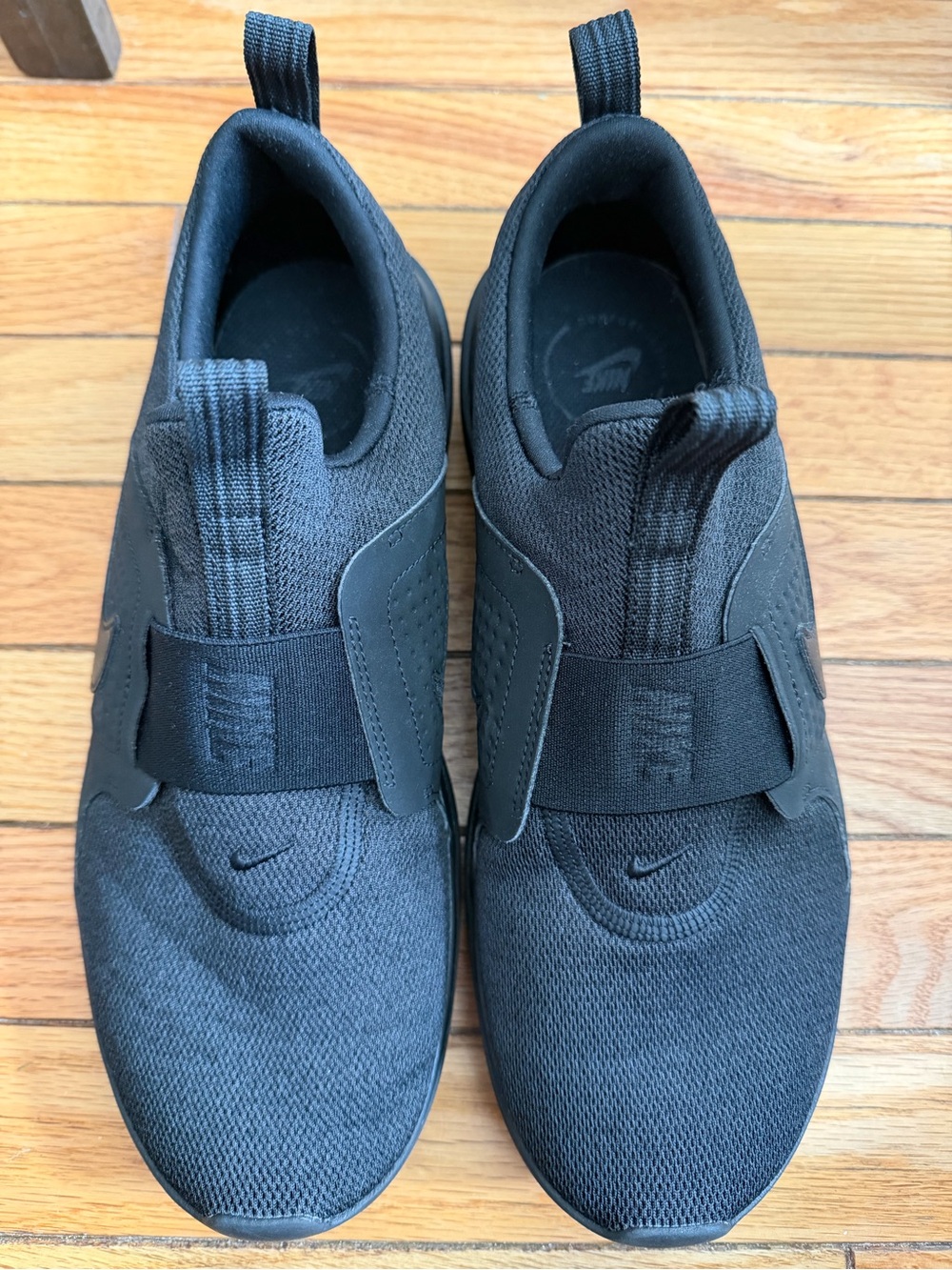 Nike Ladies Black Slip-On Athletic Shoes with Midfoot Strap